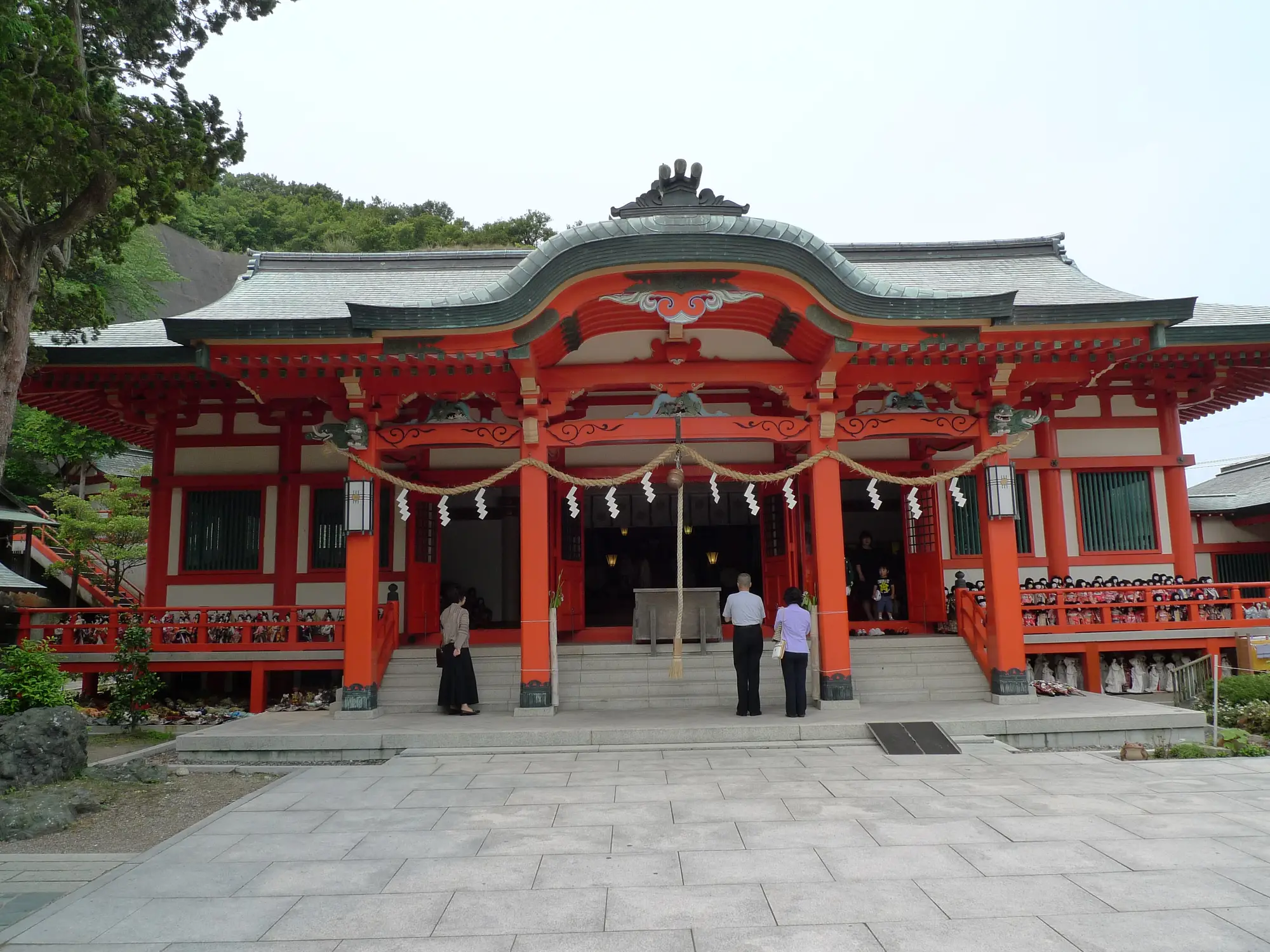 Rows of votive dolls covering the halls of Awashima Shrine, Kada, Wakayama